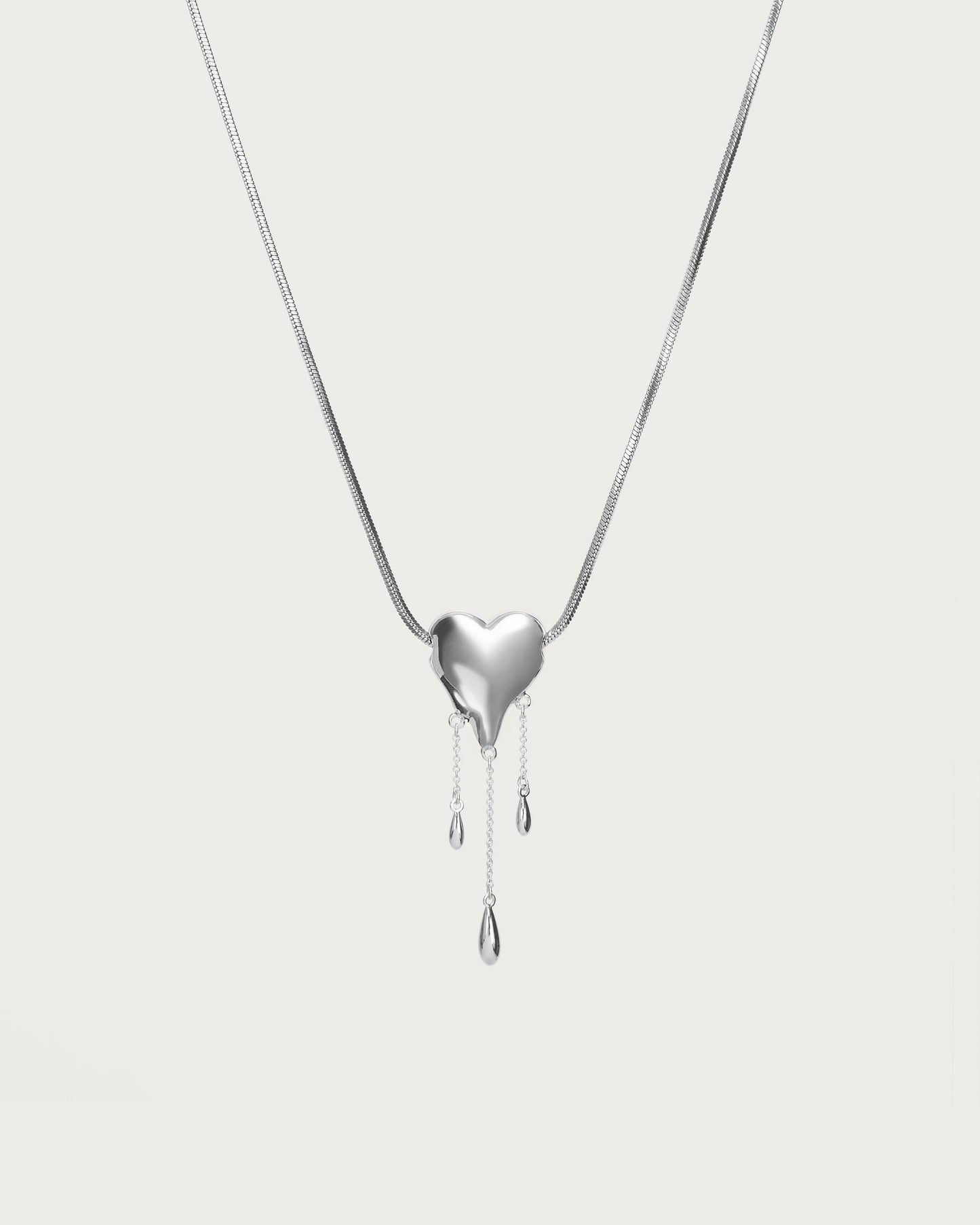 Venom’s Golden Drip Heart Necklace