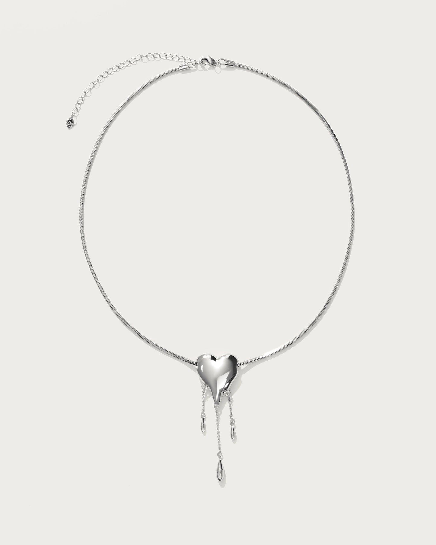 Venom’s Golden Drip Heart Necklace in Silver