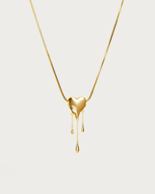 Venom’s Golden Drip Heart Necklace